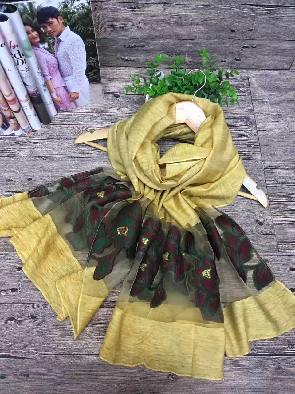 Two rose cut flowers in spring and summer sun exhausted embroidery shawl
