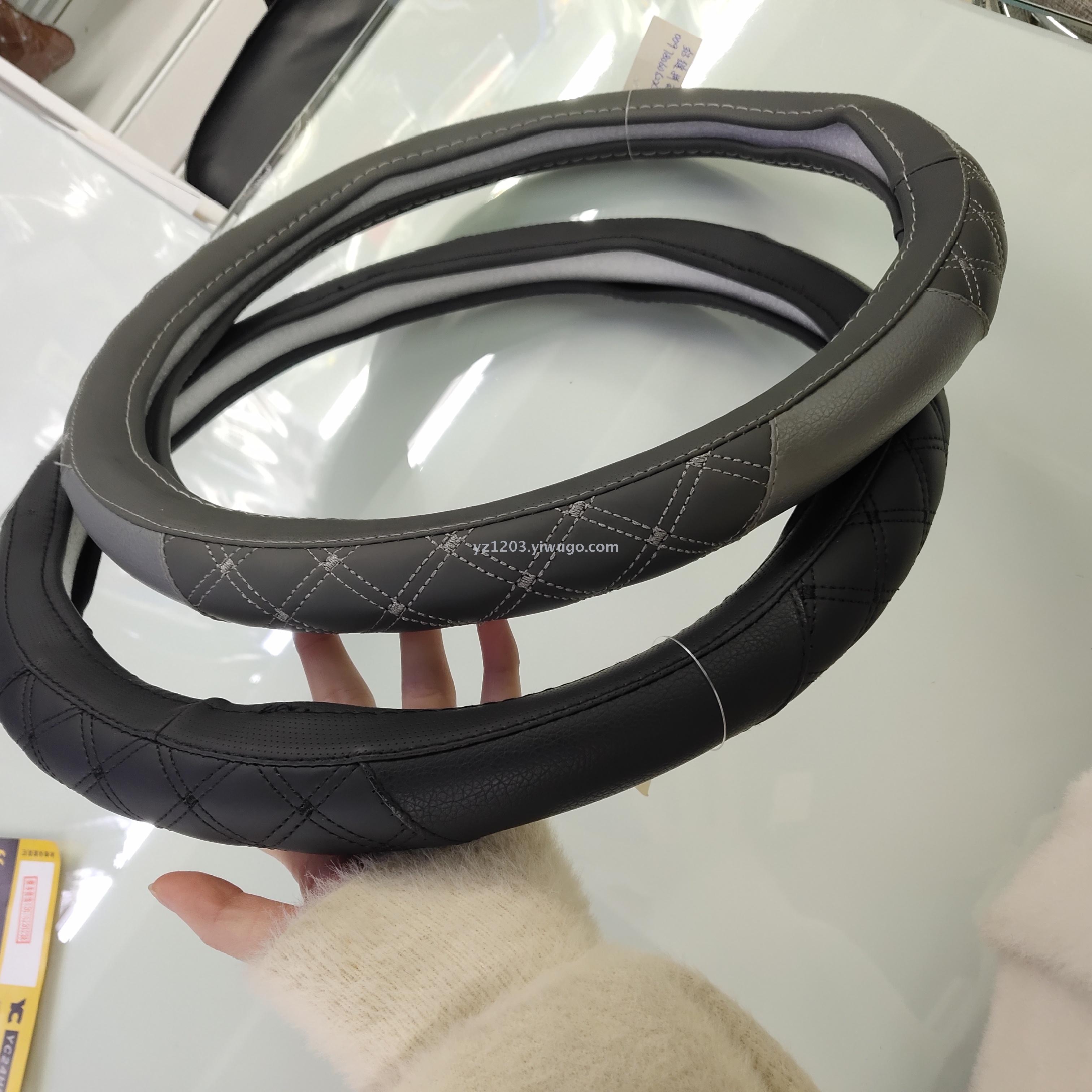 Anti - leather steering wheel cover manufacturer direct sales four seasons with hand sewing leather car handle cover