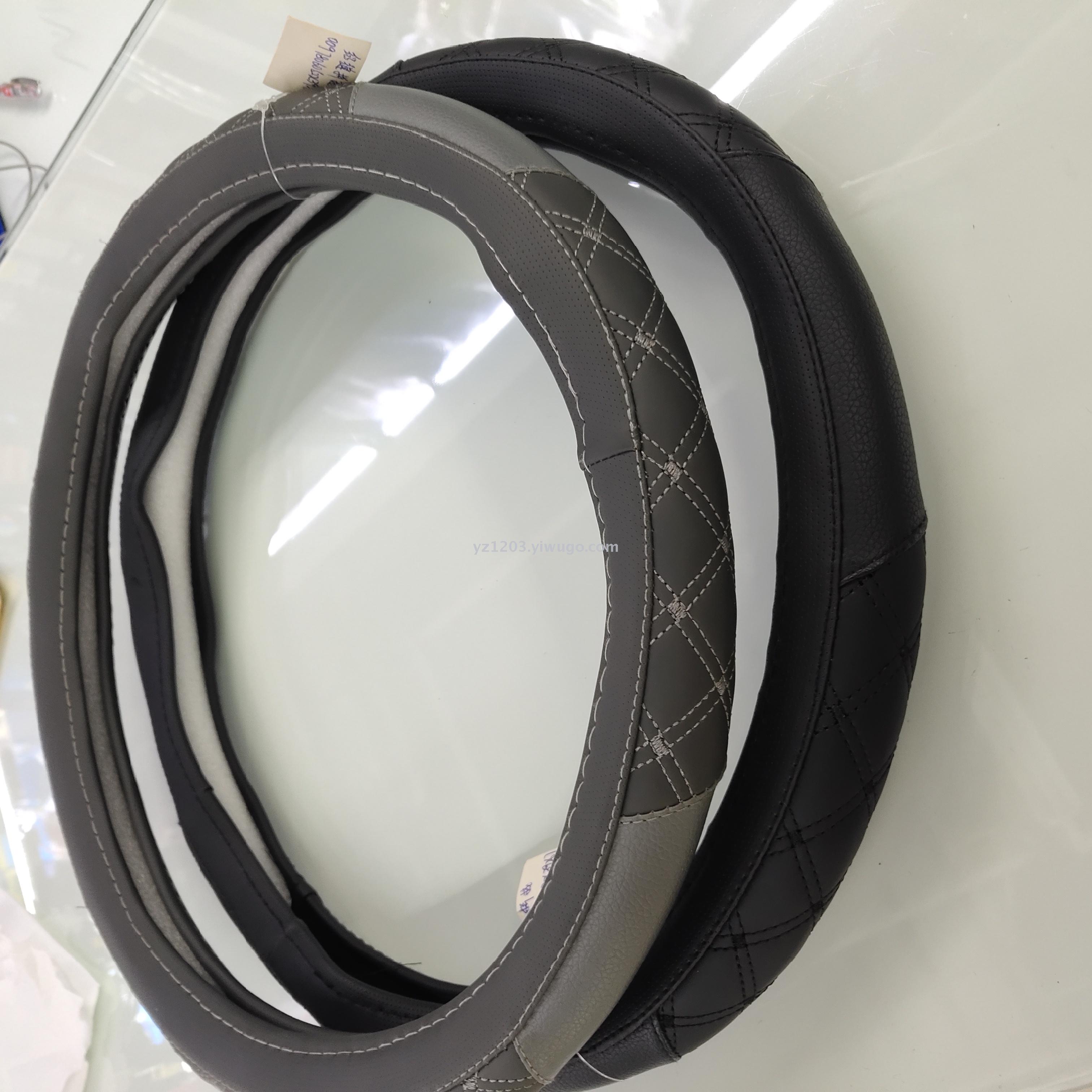 Anti - leather steering wheel cover manufacturer direct sales four seasons with hand sewing leather car handle cover