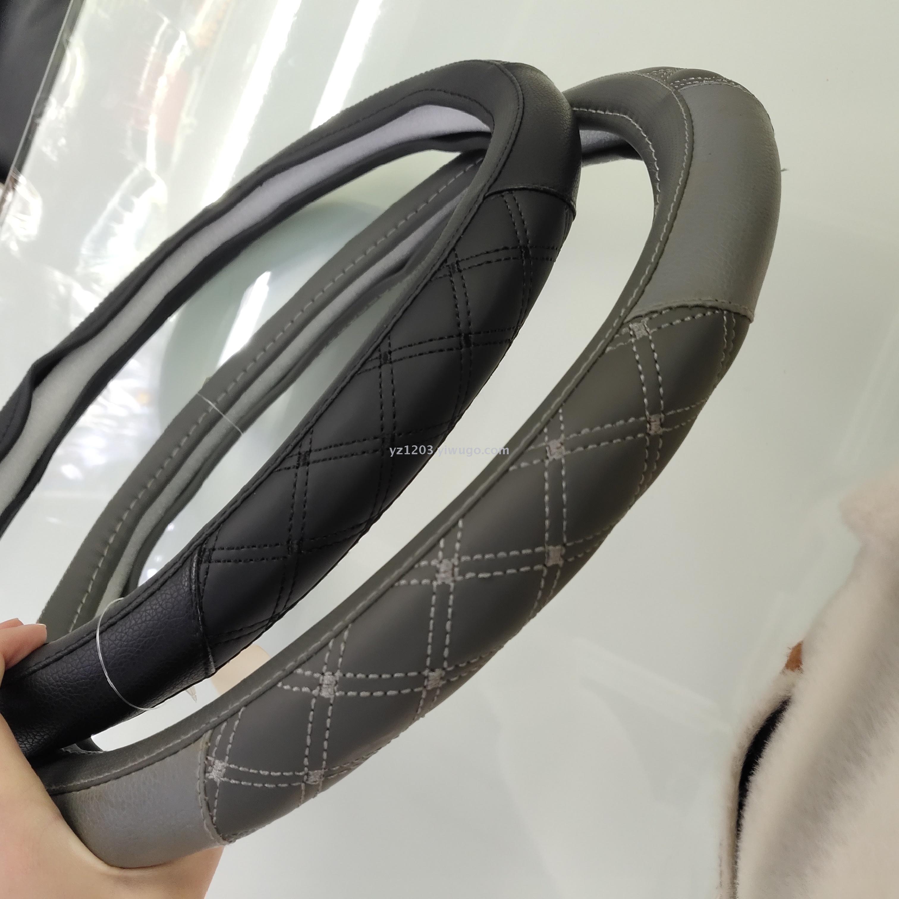Anti - leather steering wheel cover manufacturer direct sales four seasons with hand sewing leather car handle cover