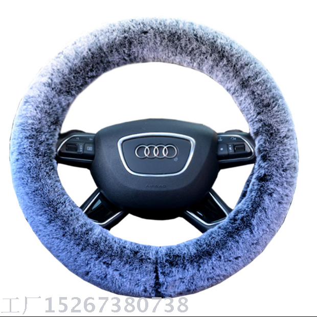The car sets the winter plush steering wheel cover with a snowflake steering wheel.