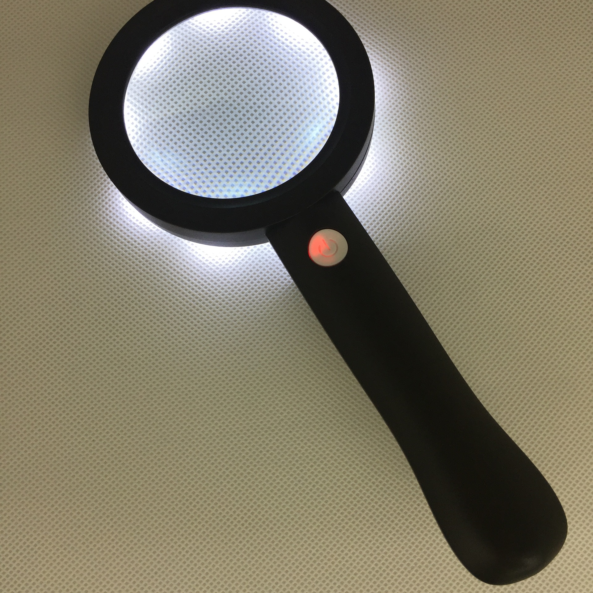 The new rechargeable thickened glass power reading magnifier is he green/black with 9 LED light 3 - position switches