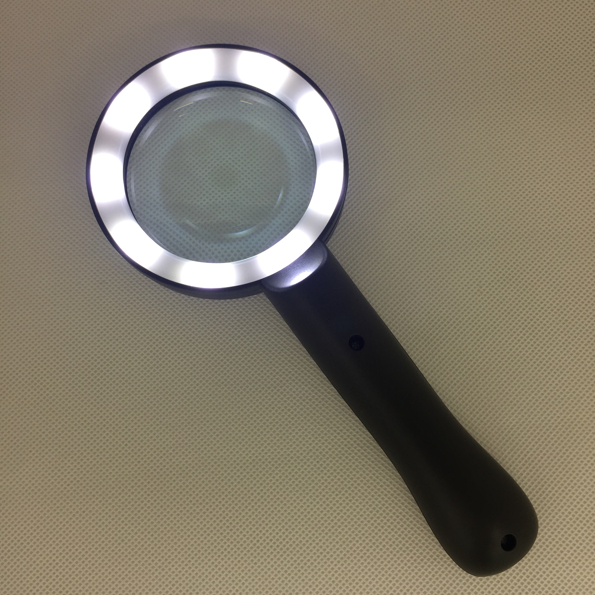 The new rechargeable thickened glass power reading magnifier is he green/black with 9 LED light 3 - position switches