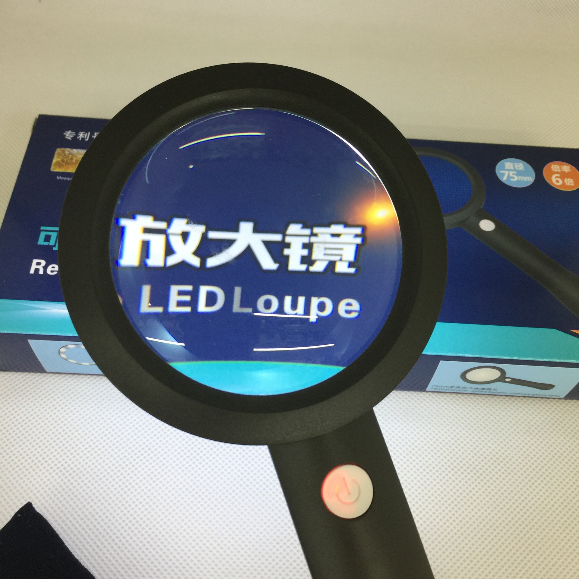 The new rechargeable thickened glass power reading magnifier is he green/black with 9 LED light 3 - position switches