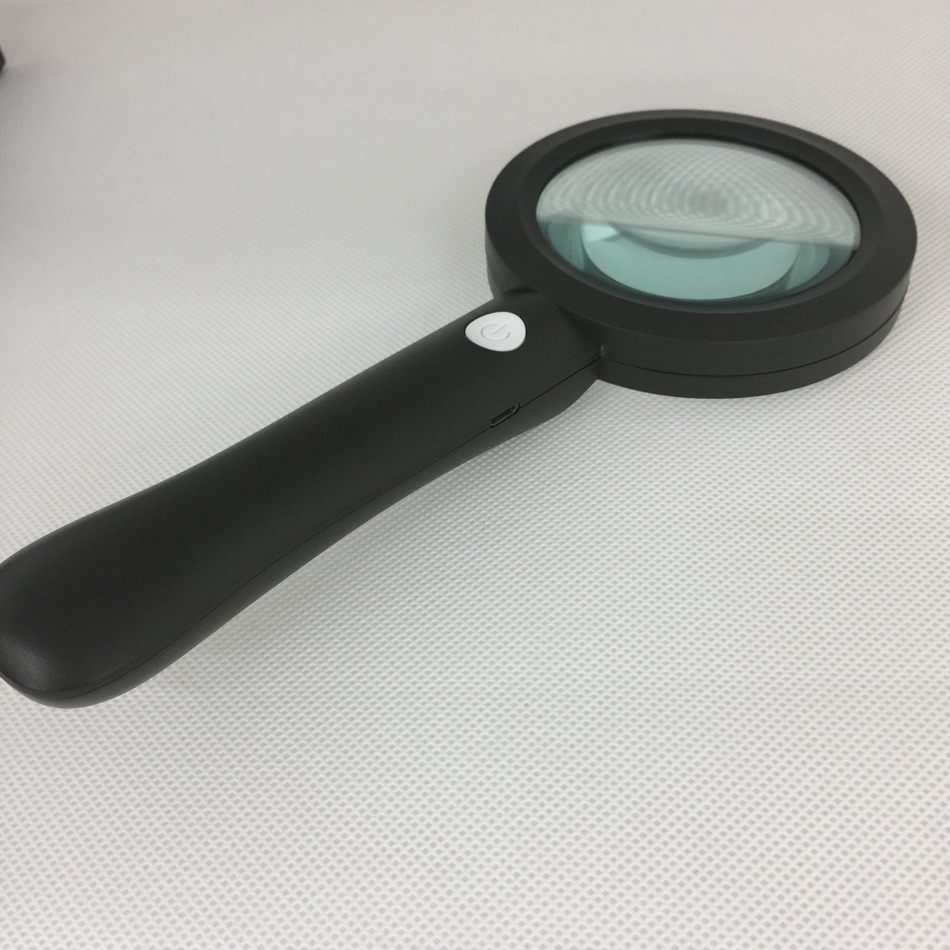 The new rechargeable thickened glass power reading magnifier is he green/black with 9 LED light 3 - position switches