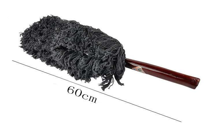 Car wash tool with red wood handle and wax brush