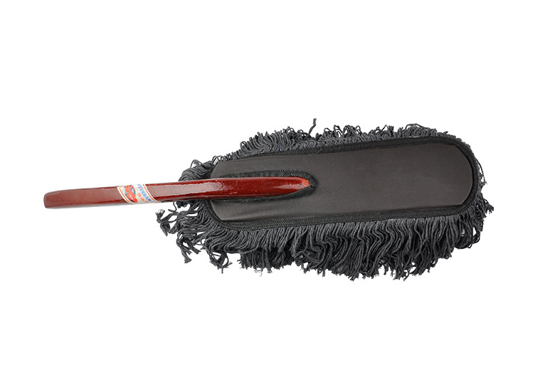 Car wash tool with red wood handle and wax brush