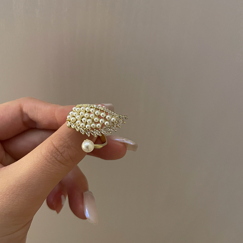 No. 7 Pearl Micro Inlaid Zircon Open Ring Korean Design Angel Wings Female Fashion Ring Simple Personality Bracelet No. 7 Pearl Micro Inlaid Zircon Open Ring Korean Design Angel Wings Female Fashion Ring Simple Personality Bracelet