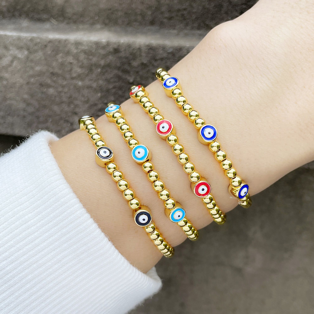 Cross-Border Amazon Hot Sale European and American New Personalized Golden Ball Bracelet Devil&#039;s Eye Elastic Bracelet Bre49