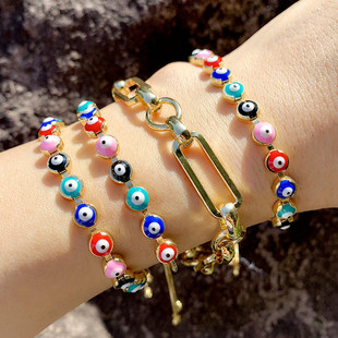 Cross-Border Amazon Hot Sale European and American New Personalized Golden Ball Bracelet Devil's Eye Elastic Bracelet Bre49