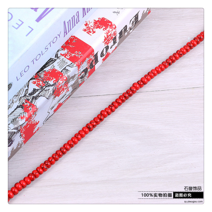 The red turquoise spacer plate is separated by a disc of red and red stone accessories The red turquoise spacer plate is separated by a disc of red and red stone accessories