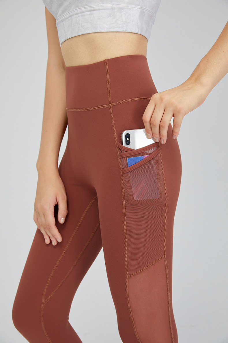 2022 European and American New Side Pocket Nude Feel Yoga Pants Women's High Waist Stretch Slim Fit Sports Ninth Pants Autumn and Winter