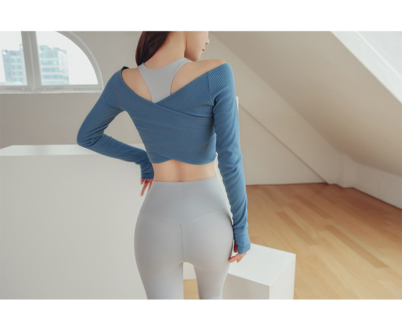 New Back Shaping Yoga Clothes Women's Loose QuickDrying Top Navel Workout Long Sleeve Tshirt Sports Top Training Wear New Back Shaping Yoga Clothes Women's Loose QuickDrying Top Navel Workout Long Sleeve Tshirt Sports Top Training Wear