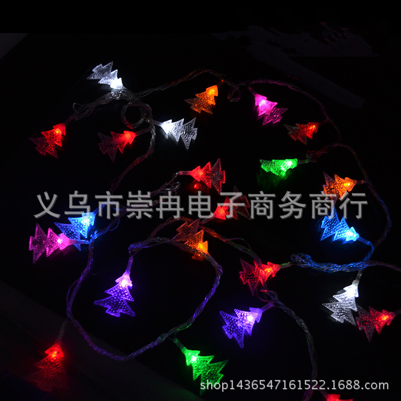 Christmas lights are strung around the Christmas tree