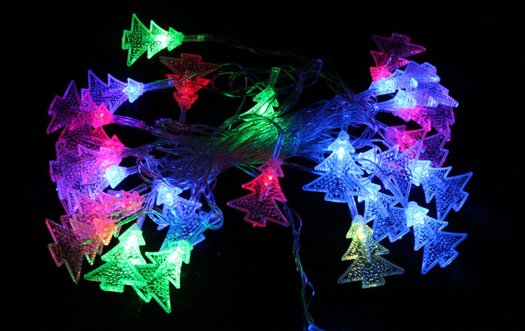 Christmas lights are strung around the Christmas tree