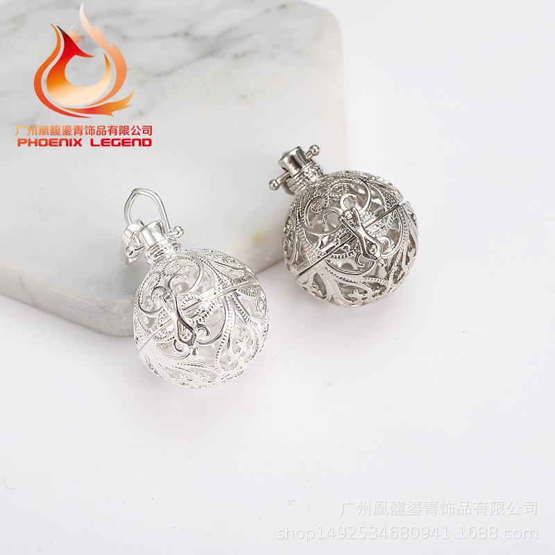 Factory direct sale lady jingyin ball refined oil bottle hollow - out five pointed star magic box aroma phase box sweater necklace pendant