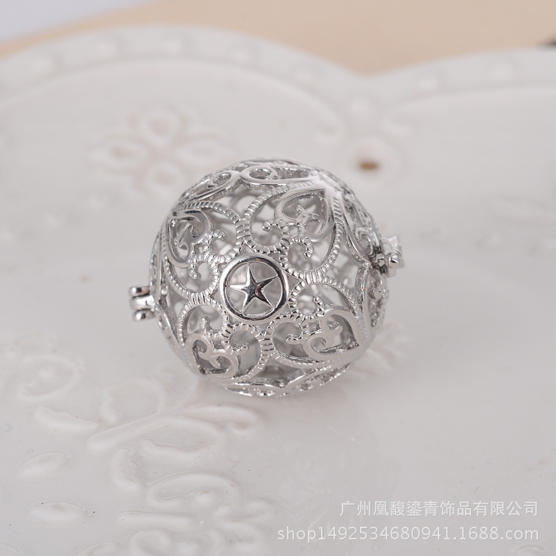 Factory direct sale lady jingyin ball refined oil bottle hollow - out five pointed star magic box aroma phase box sweater necklace pendant