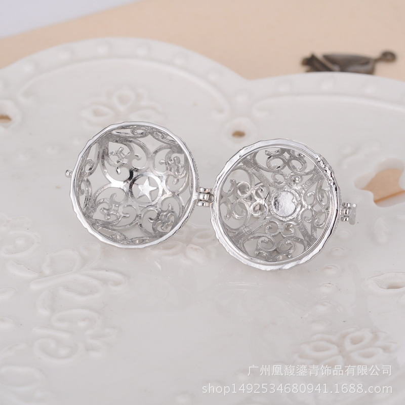 Factory direct sale lady jingyin ball refined oil bottle hollow - out five pointed star magic box aroma phase box sweater necklace pendant