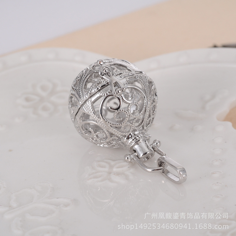 Factory direct sale lady jingyin ball refined oil bottle hollow - out five pointed star magic box aroma phase box sweater necklace pendant