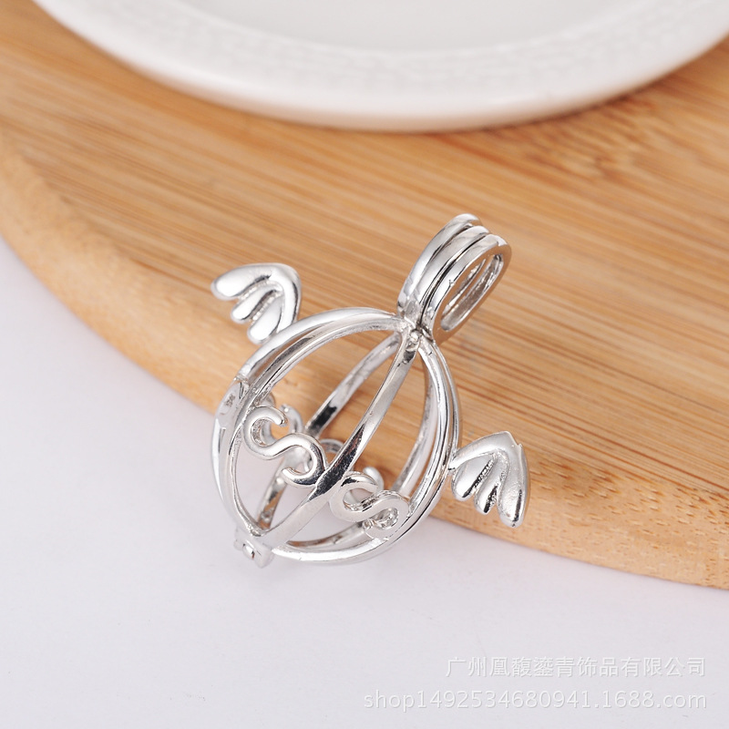 Getting pregnant woman harp ball refined oil bottle hollowed out pearl purse wing magic box aroma&amp;fragrance phase box sweater necklace pendant