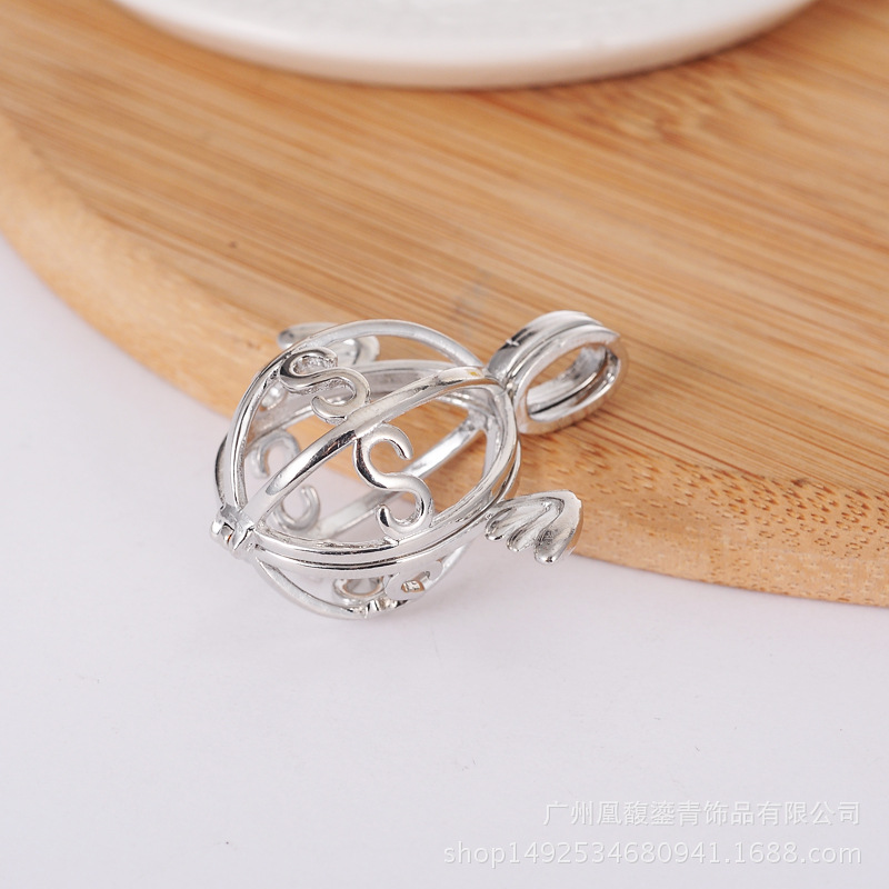 Getting pregnant woman harp ball refined oil bottle hollowed out pearl purse wing magic box aroma&fragrance phase box sweater necklace pendant