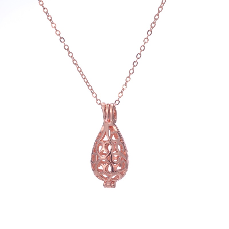 DIY ladies pregnant women qinyin ball refined oil bottle hollowed - out drip magic box aroma phase box sweater necklace pendant lock