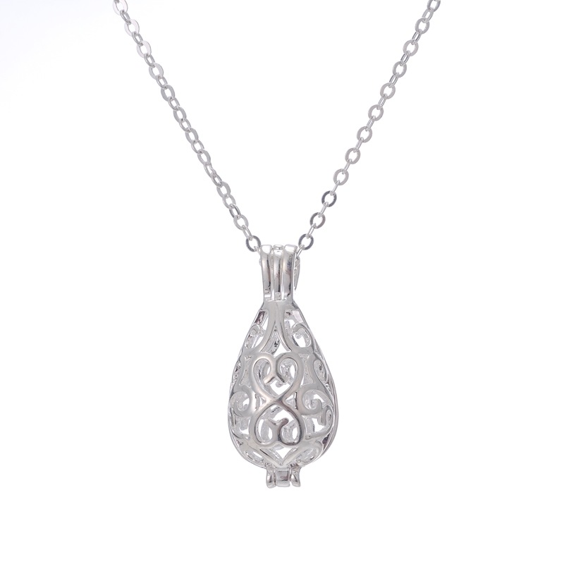 DIY ladies pregnant women qinyin ball refined oil bottle hollowed - out drip magic box aroma phase box sweater necklace pendant lock