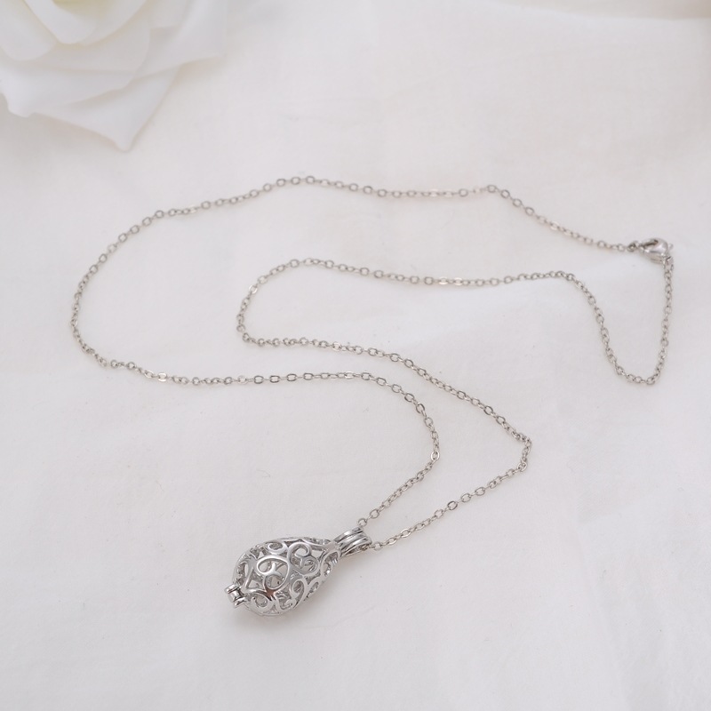DIY ladies pregnant women qinyin ball refined oil bottle hollowed - out drip magic box aroma phase box sweater necklace pendant lock DIY ladies pregnant women qinyin ball refined oil bottle hollowed - out drip magic box aroma phase box sweater necklace pendant lock