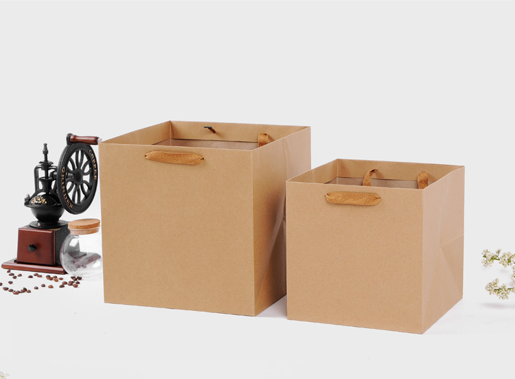 Spot wholesale kraft flowers gift bag environmental gift box packaging bag can be gift logo square bottom handbag Spot wholesale kraft flowers gift bag environmental gift box packaging bag can be gift logo square bottom handbag