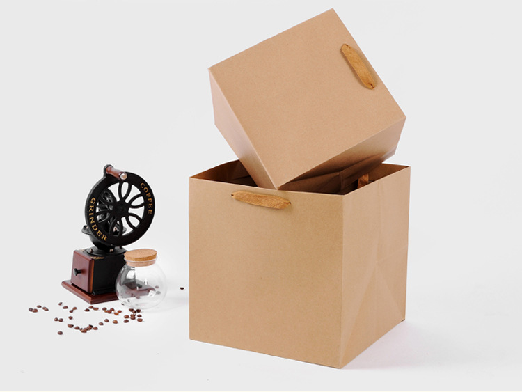 Spot wholesale kraft flowers gift bag environmental gift box packaging bag can be gift logo square bottom handbag Spot wholesale kraft flowers gift bag environmental gift box packaging bag can be gift logo square bottom handbag