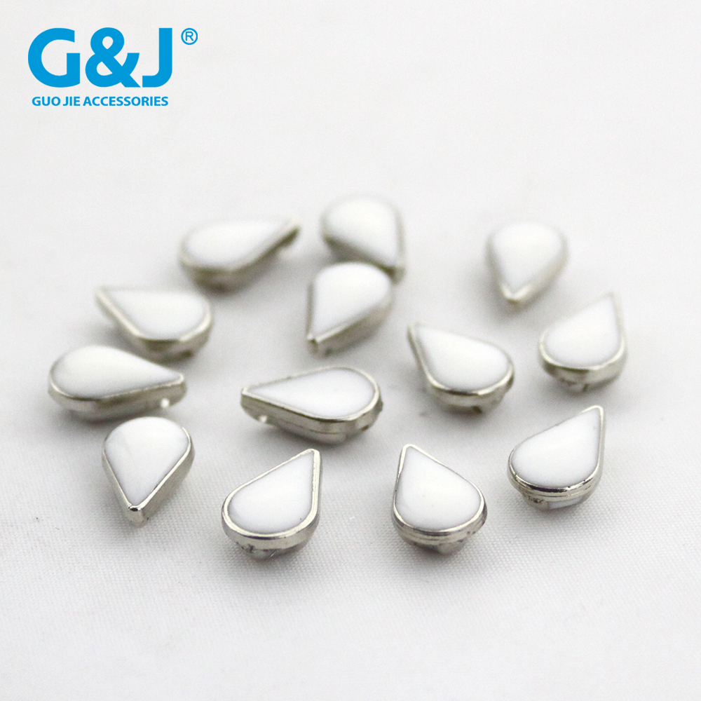 ABS plastic electroplated drip-drip, four-hole shirt button with high drop button. ABS plastic electroplated drip-drip, four-hole shirt button with high drop button.
