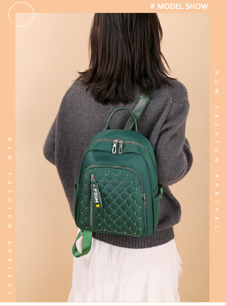 2020 New Women's Bag Oxford Cloth Backpack Waterproof Nylon Schoolbag Women's Korean Style Rivet Casual Backpack Wholesale