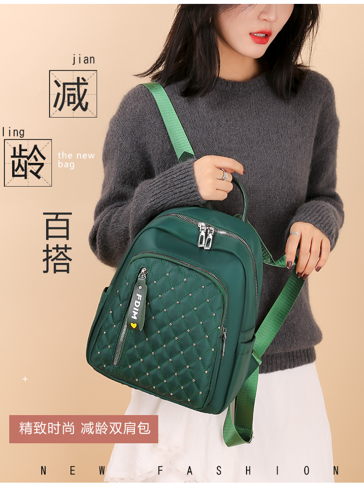 2020 New Women's Bag Oxford Cloth Backpack Waterproof Nylon Schoolbag Women's Korean Style Rivet Casual Backpack Wholesale