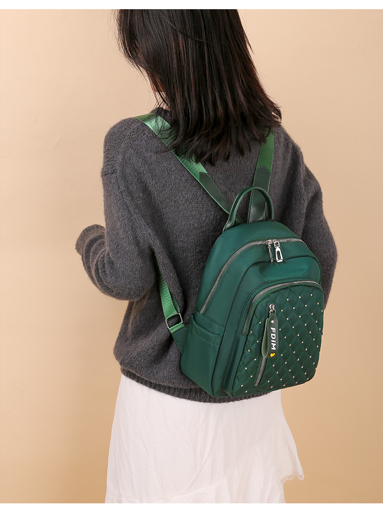 2020 New Women's Bag Oxford Cloth Backpack Waterproof Nylon Schoolbag Women's Korean Style Rivet Casual Backpack Wholesale