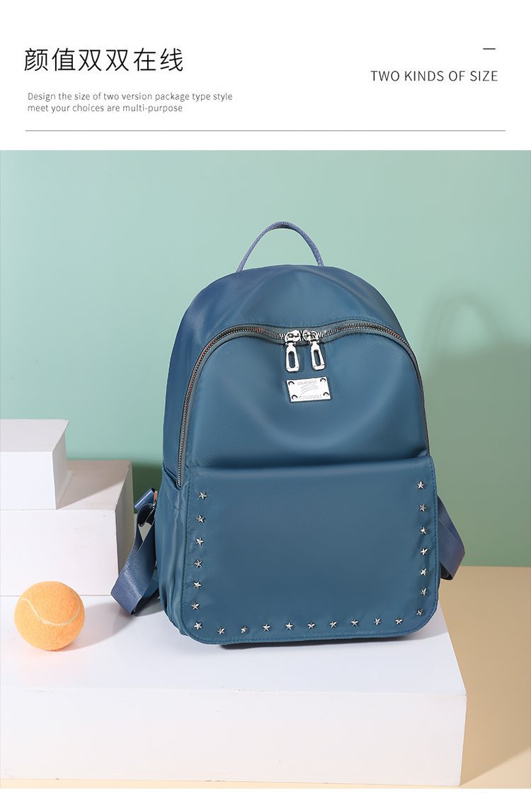 Foreign Trade Wholesale Spring and Autumn New Trendy Japanese and Korean Style Casual Temperament Sports Rivet XINGX Nylon Backpack Women's Bag Foreign Trade Wholesale Spring and Autumn New Trendy Japanese and Korean Style Casual Temperament Sports Rivet XINGX Nylon Backpack Women's Bag