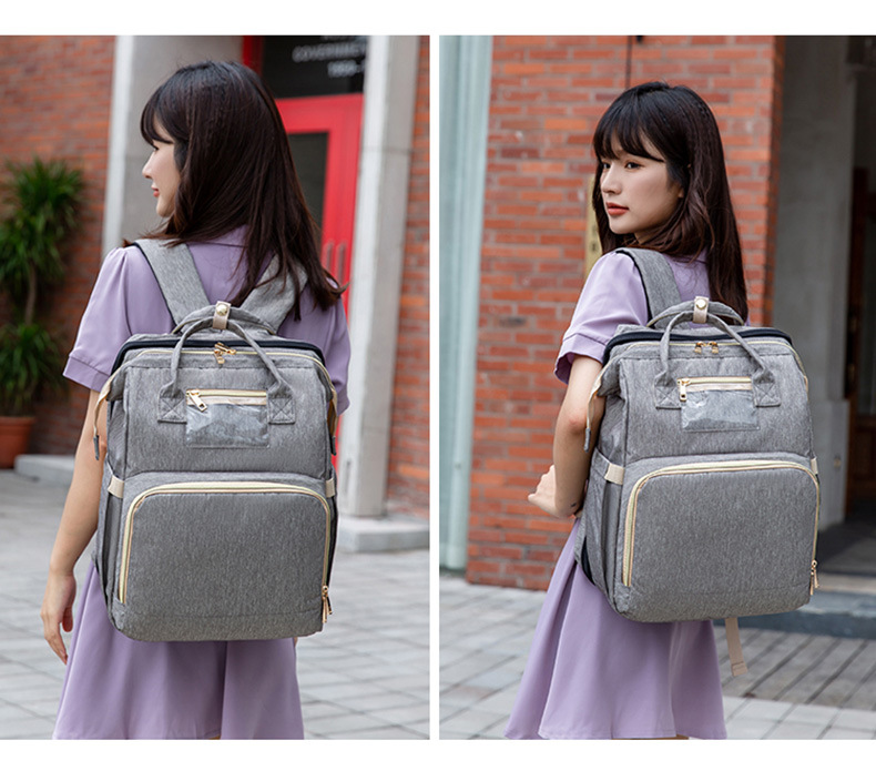 a Large Number of Stock New MultiFunction Diaper Bag Folding Bed Portable Foldable Crib Mother's Bag a Large Number of Stock New MultiFunction Diaper Bag Folding Bed Portable Foldable Crib Mother's Bag