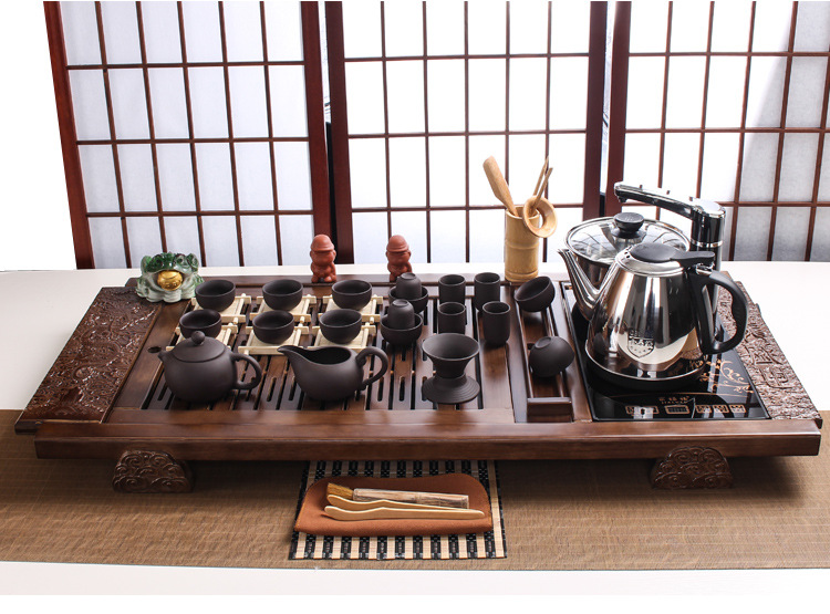 Black Gold Stone Tea Tray Yixing Purple Sand Tea Set Solid Wood Tea Tray FourInOne Induction Cooker Special Gift Whole Black Gold Stone Tea Tray Yixing Purple Sand Tea Set Solid Wood Tea Tray FourInOne Induction Cooker Special Gift Whole