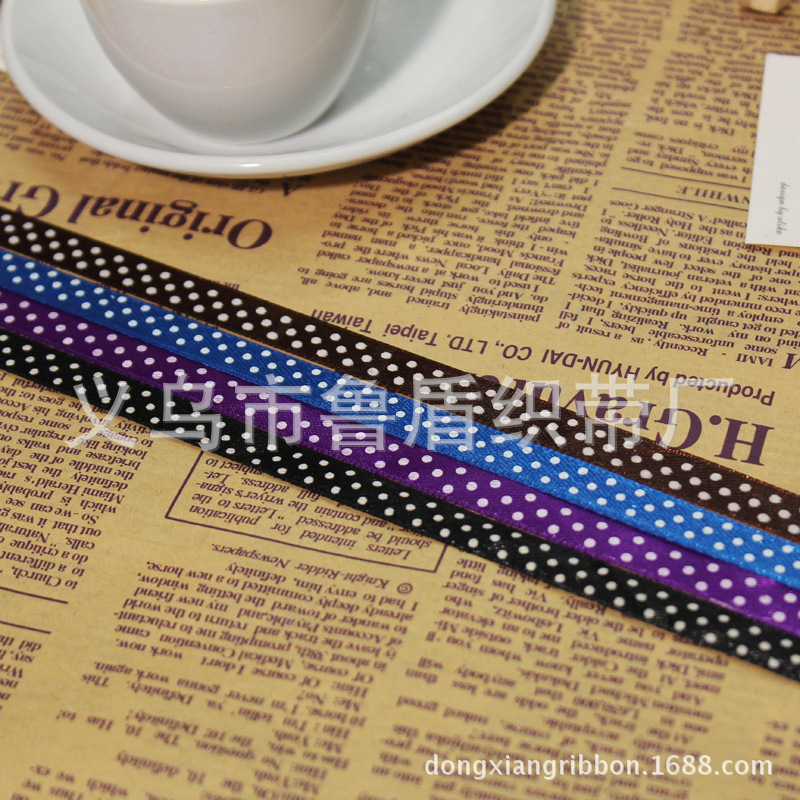 Yiwu dongxiang, ribbon manufacturers straight rib belt printing text polyester belt printing.