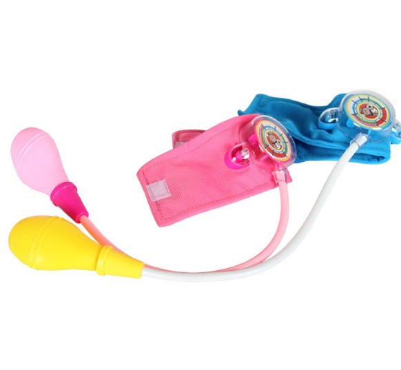 A child's imitation family doctor's toy takes blood pressure of a little doctor and nurse A child's imitation family doctor's toy takes blood pressure of a little doctor and nurse