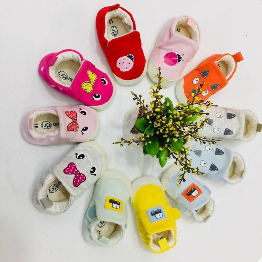 Snow doll baby men and women baby shoes leather grain soft sole skin-friendly cotton manufacturers