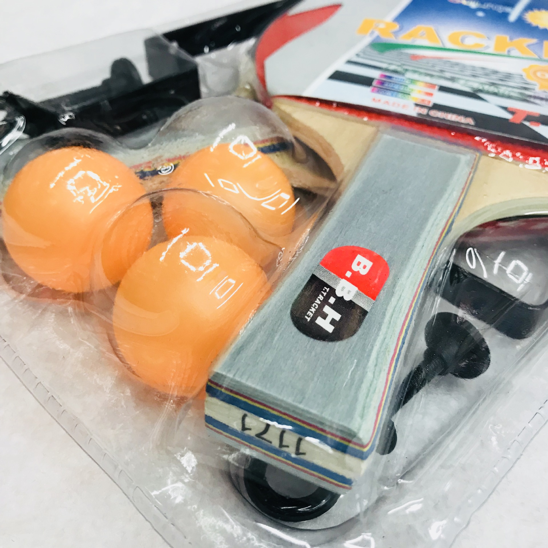 Manufacturer's direct selling OULITE table tennis bat 1171 with a net frame 7 mm laminated color handle and rubber 