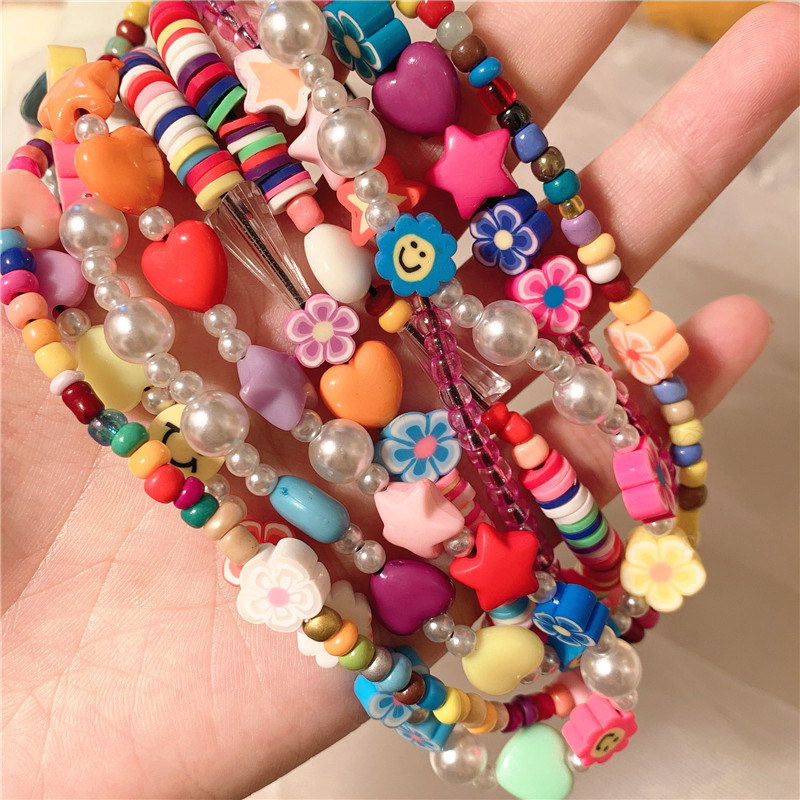 New Korean Style Ins Creative Bohemian Polymer Clay Smiley Face Stringed Pearls Mobile Phone Lanyard Acrylic Mobile Phone Charm