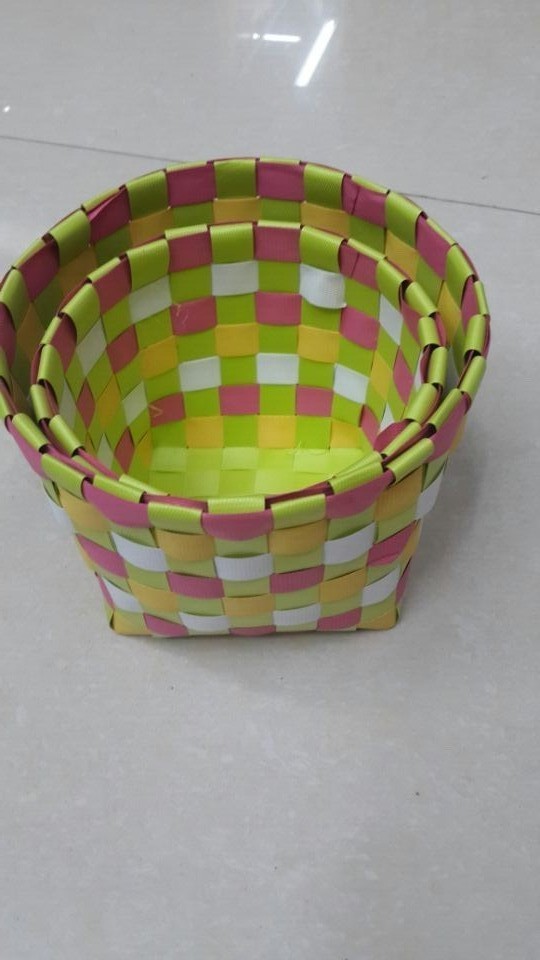 Set of 2 hand-woven Ribbon strapping round oval coloured storage baskets Set of 2 hand-woven Ribbon strapping round oval coloured storage baskets