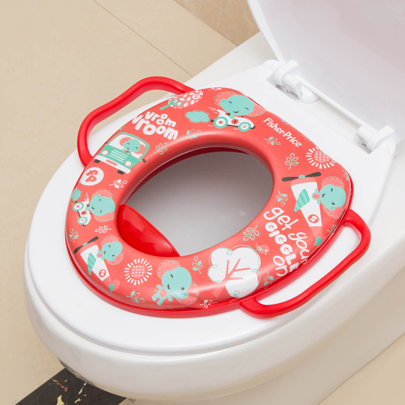 Children&#039;s seat with handle children with PVC printed soft cushion seat on the toilet seat.