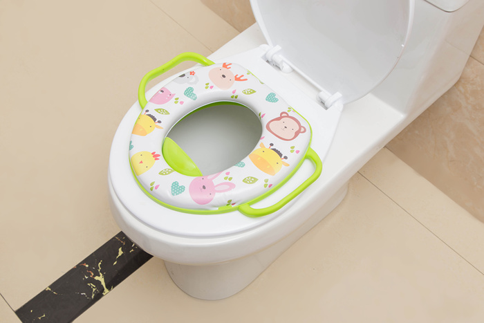 Children's seat with handle children with PVC printed soft cushion seat on the toilet seat. Children's seat with handle children with PVC printed soft cushion seat on the toilet seat.