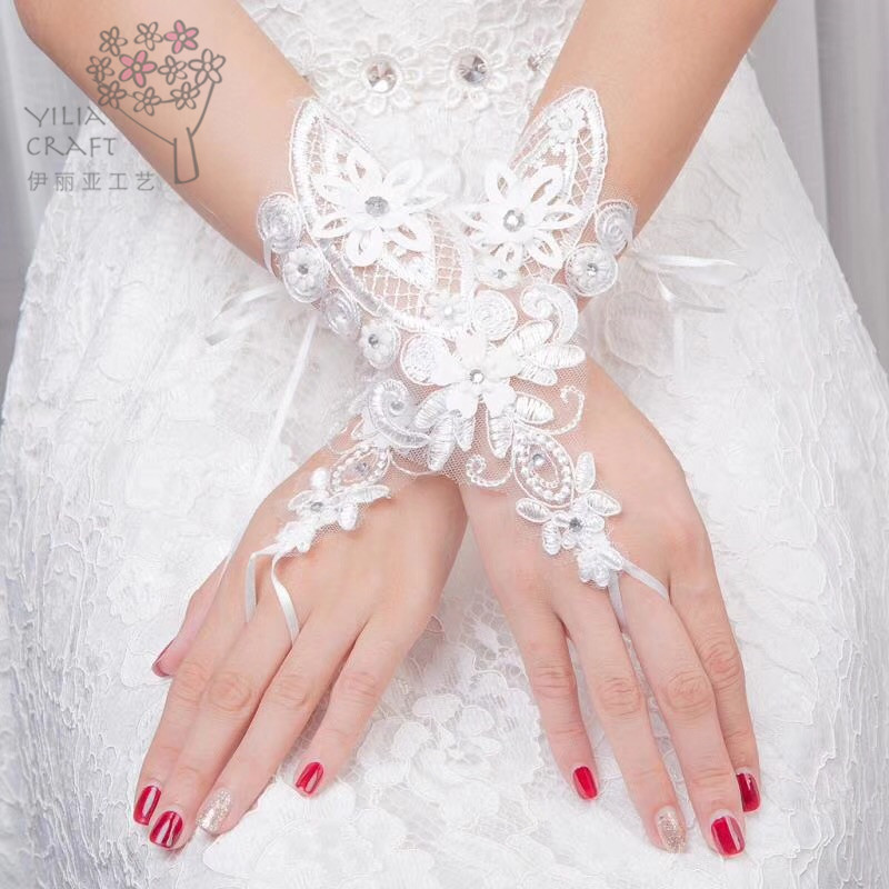 2018 new Korean bride gloves wedding dress length lace embroidery dew point white gloves.