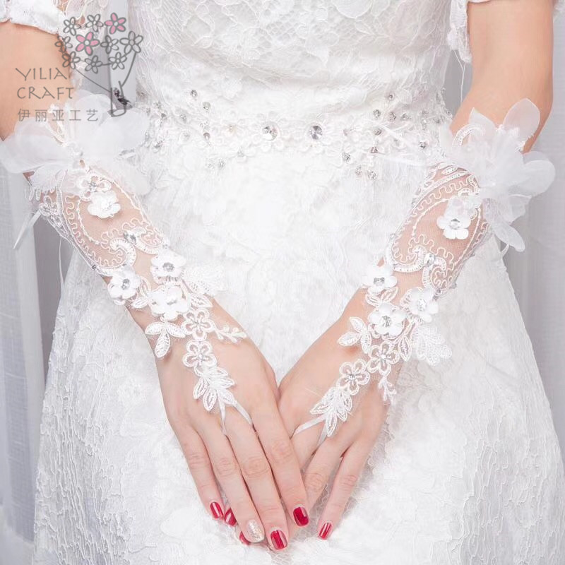 2018 new Korean bride gloves wedding dress length lace embroidery dew point white gloves.