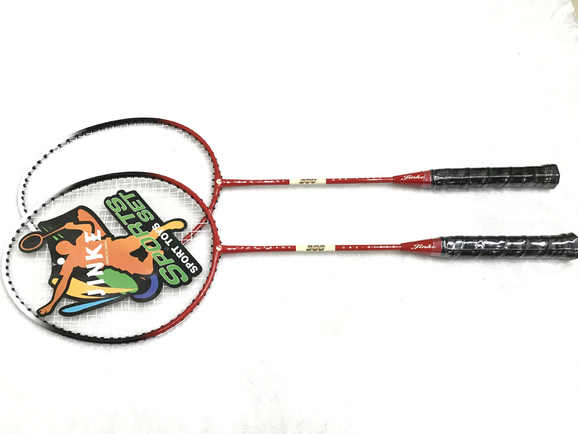 The factory direct selling JINKE-302 badminton rackets 2 pieces to take super light alloy competition training. The factory direct selling JINKE-302 badminton rackets 2 pieces to take super light alloy competition training.