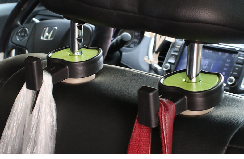 The small apple car is connected to a multi-purpose seatback hook with a multi-purpose seatback hook with an r-x5011.