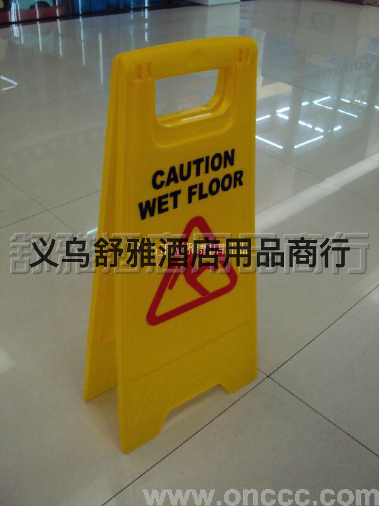 Signs (in English) sign warning caution slippery parking will be prohibited on